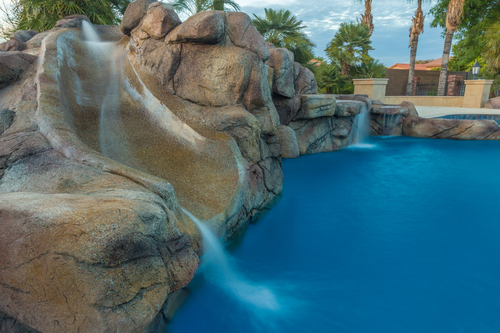 This is an example of a large mediterranean swimming pool in Phoenix.
