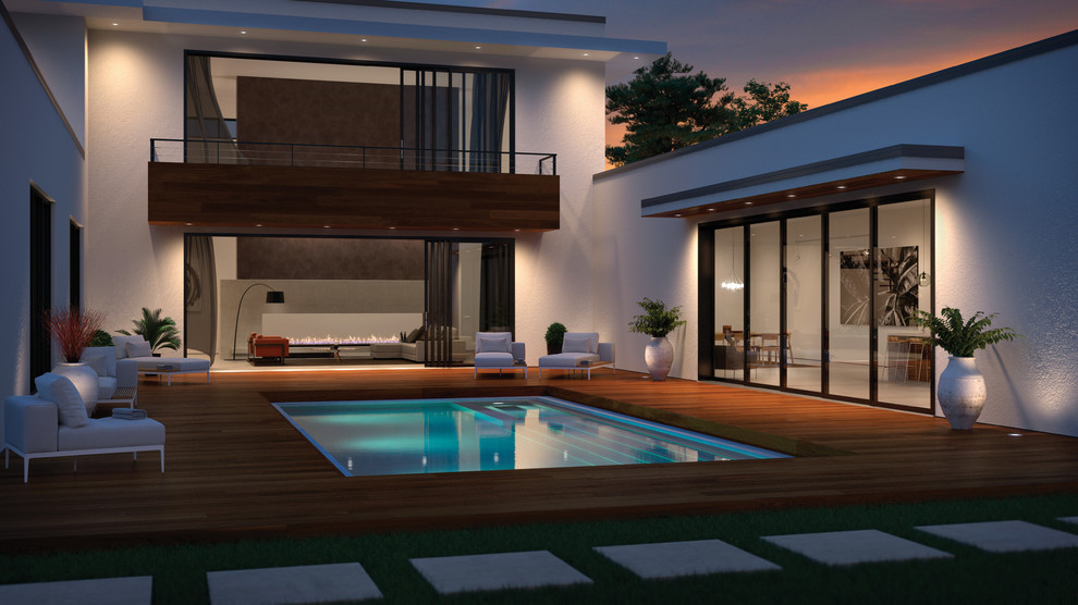 Cette image montre un couloir de nage arrière minimaliste de taille moyenne et rectangle avec une terrasse en bois.