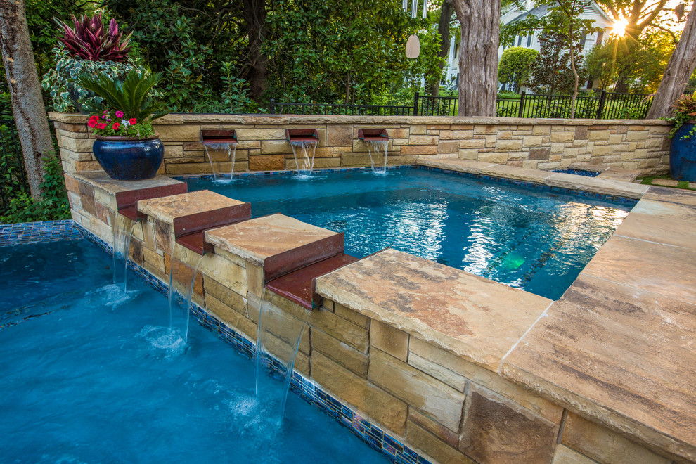 This is an example of a contemporary swimming pool in Dallas.