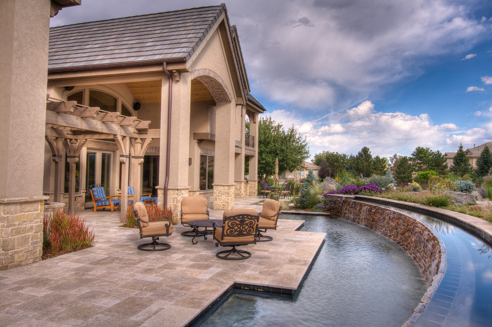 Photo of a medium sized traditional back custom shaped swimming pool in Denver.