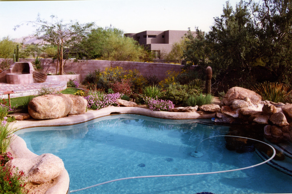 Design ideas for a contemporary swimming pool in Phoenix.