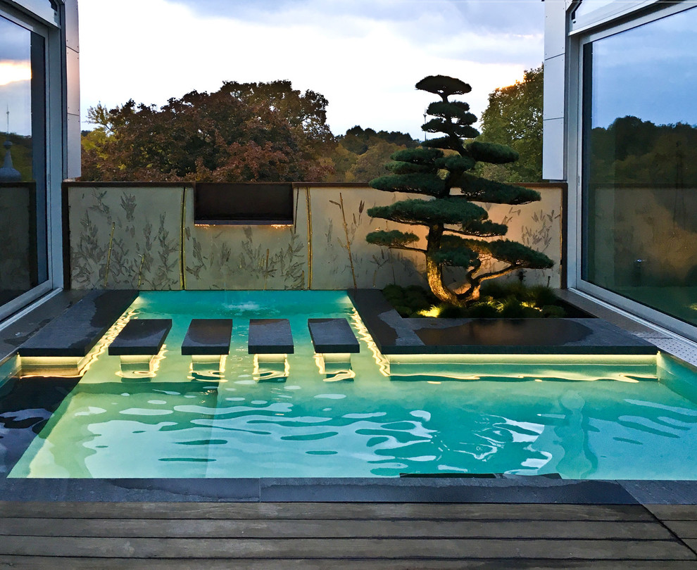Пример оригинального дизайна: маленький прямоугольный бассейн на крыше в восточном стиле для на участке и в саду