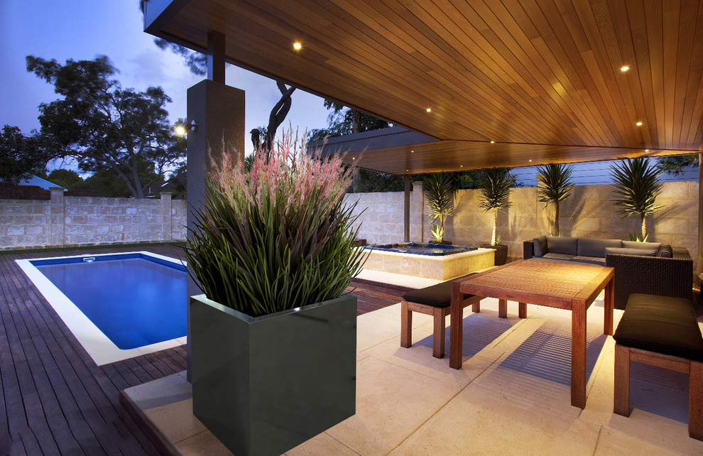 Idée de décoration pour un grand Abris de piscine et pool houses design rectangle avec une cour et du carrelage.
