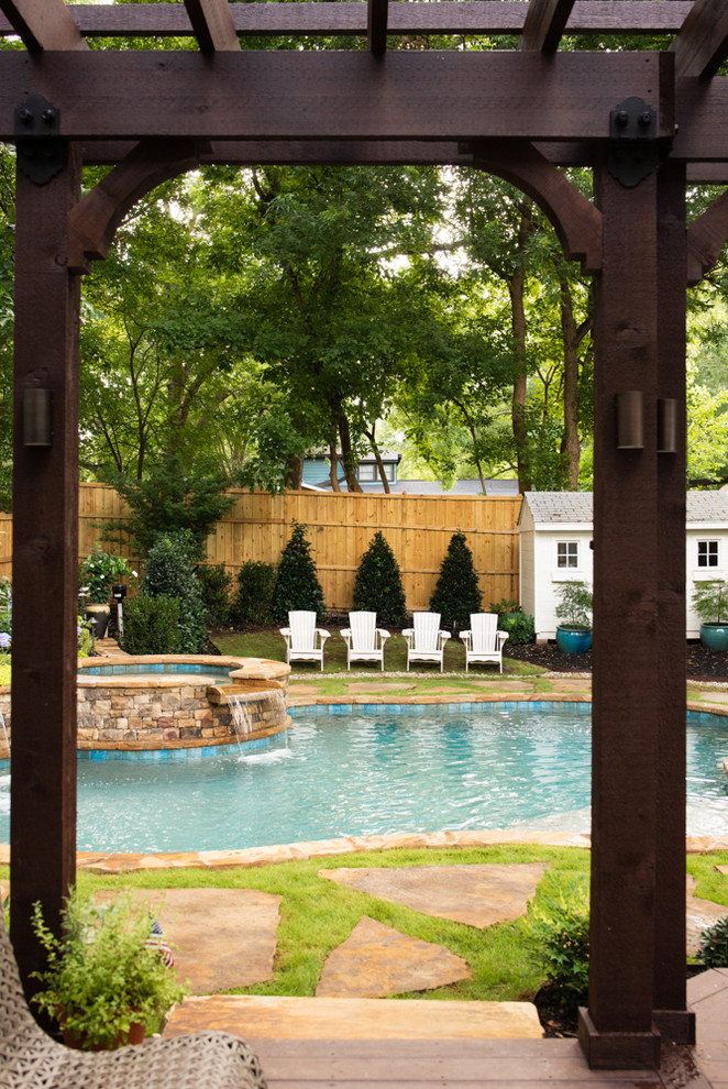 Cette photo montre une petite piscine arrière craftsman en forme de haricot.