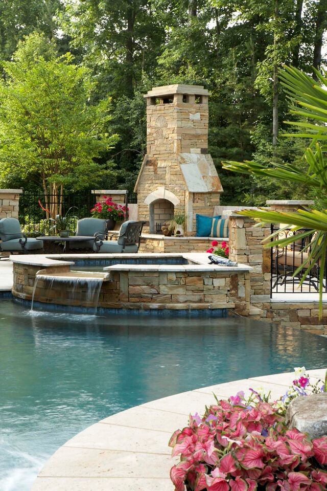 Hot tub - large transitional backyard custom-shaped and tile infinity hot tub idea in Atlanta