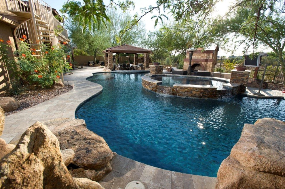 Design ideas for a mediterranean swimming pool in Phoenix.