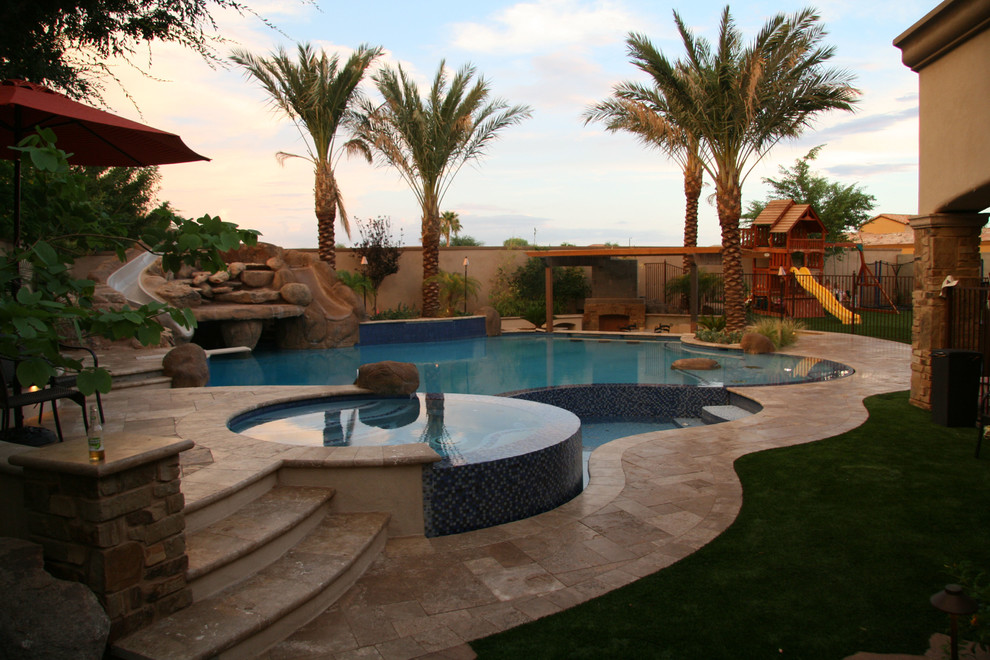 Backyard Oasis Pool Spa Swim Up Bar Grotto Slides Water Features Mediterranean Pool Phoenix By Unique Landscapes And Custom Pools Houzz