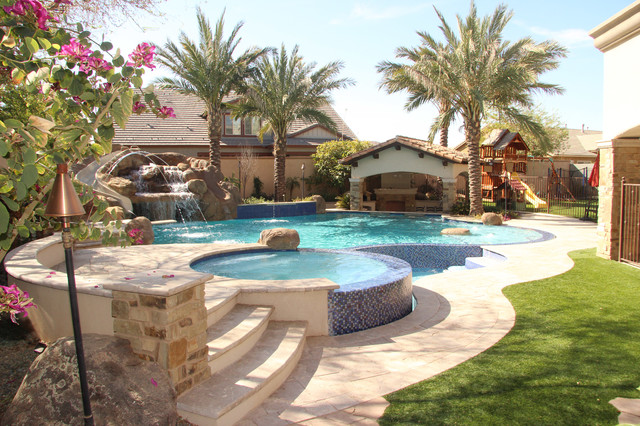 Backyard Oasis Pool Spa Swim Up Bar Grotto Slides And Water Features Mediterranean