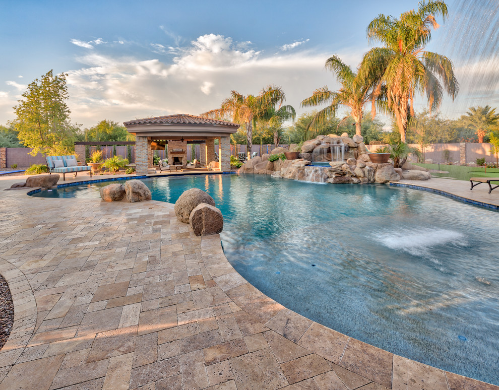 Beautiful Mesa, Arizona Backyard Mediterranean Pool Phoenix by Unique Landscapes and