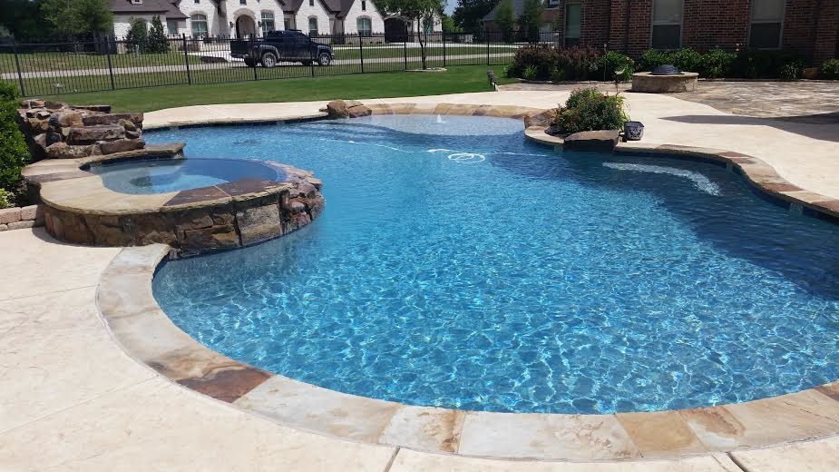 Bella Flora freeform (Aledo) Tropical Pool Dallas by The