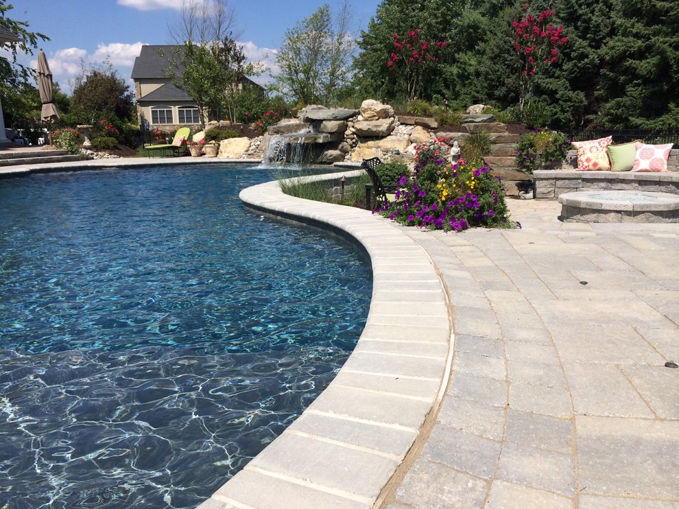 Bethlehem Township pool and spa with waterfall and sunshelf Traditional Pool Philadelphia