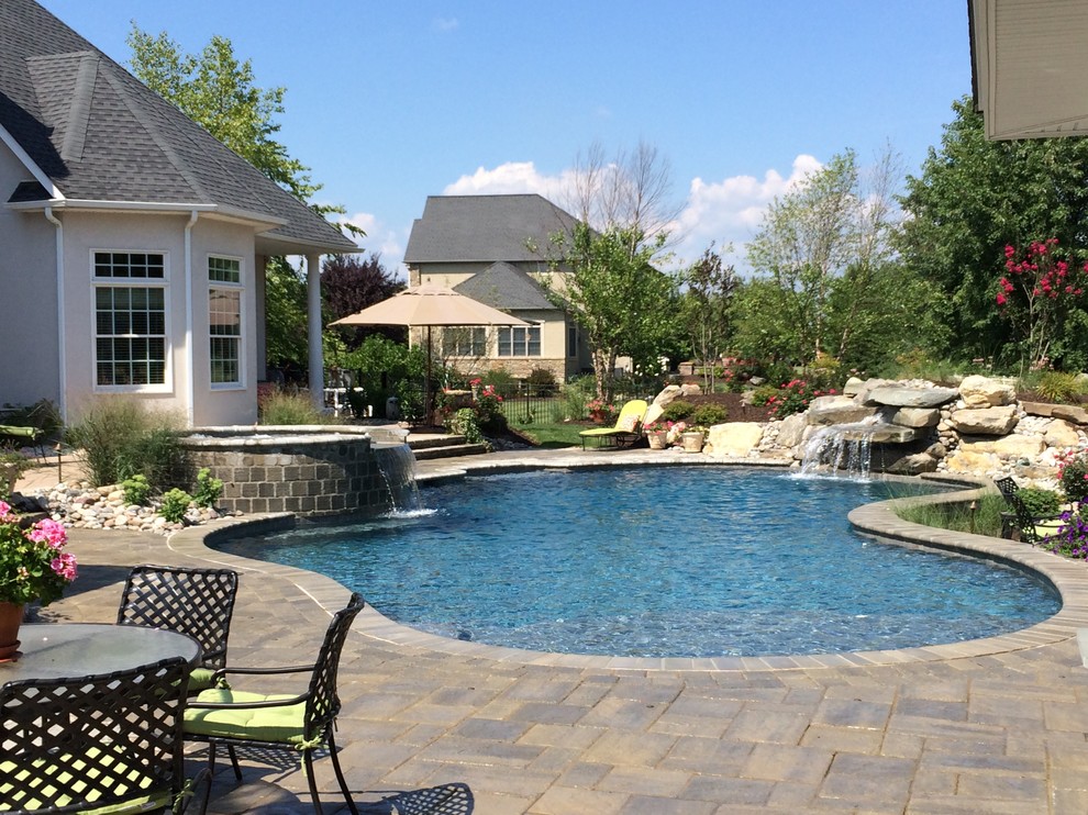 Bethlehem Township pool and spa with waterfall and sunshelf Traditional Pool Philadelphia