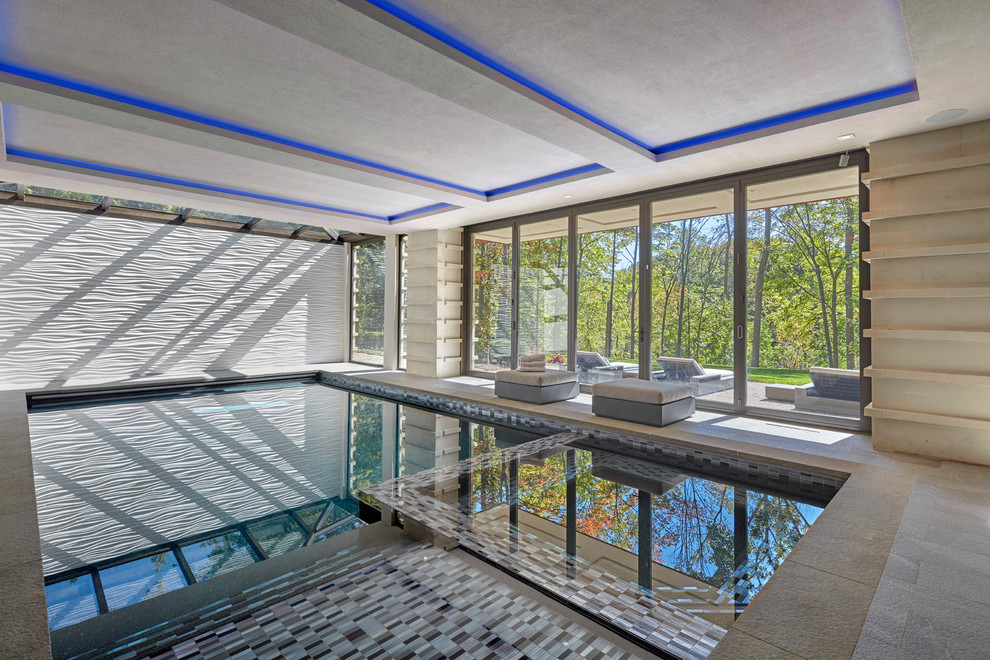 Inspiration for a contemporary pool remodel in Detroit