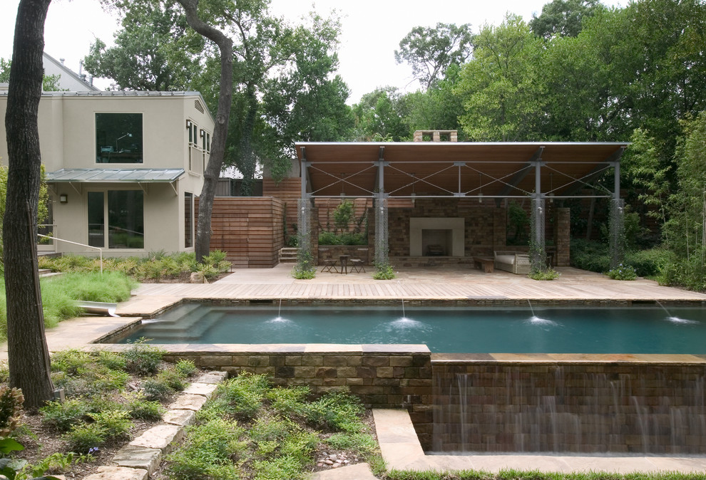 Inspiration for a contemporary swimming pool in Dallas.