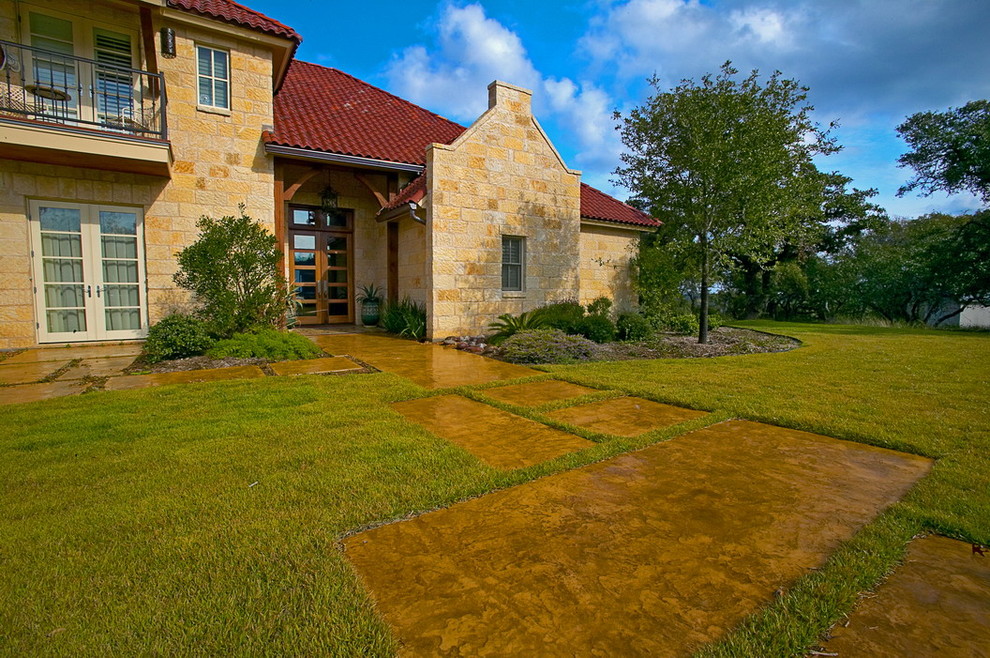 Inspiration for a huge timeless backyard concrete and rectangular lap pool remodel in Austin