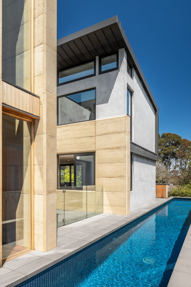 Photo of an expansive contemporary swimming pool in Melbourne.