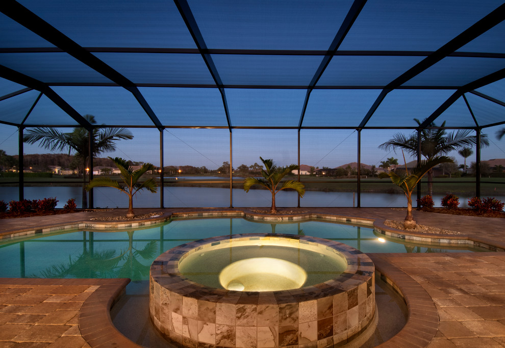 Design ideas for a mediterranean swimming pool in Tampa.