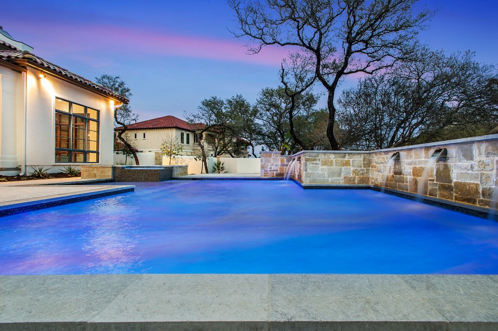 Design ideas for a mediterranean swimming pool in Austin.