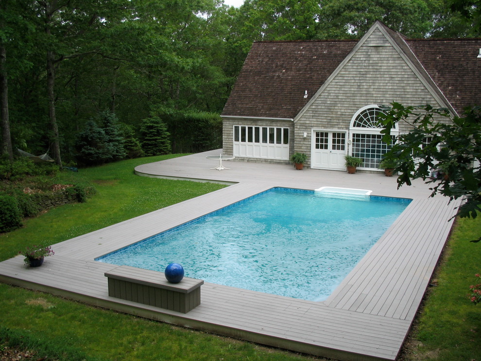 Mittelgroßer Stilmix Schwimmteich hinter dem Haus in rechteckiger Form in New York