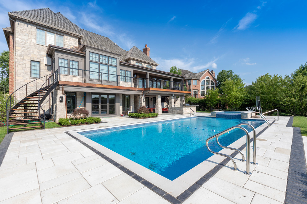 Burr Ridge Lap Pool with Raised Hot Tub and Waterfall Traditional
