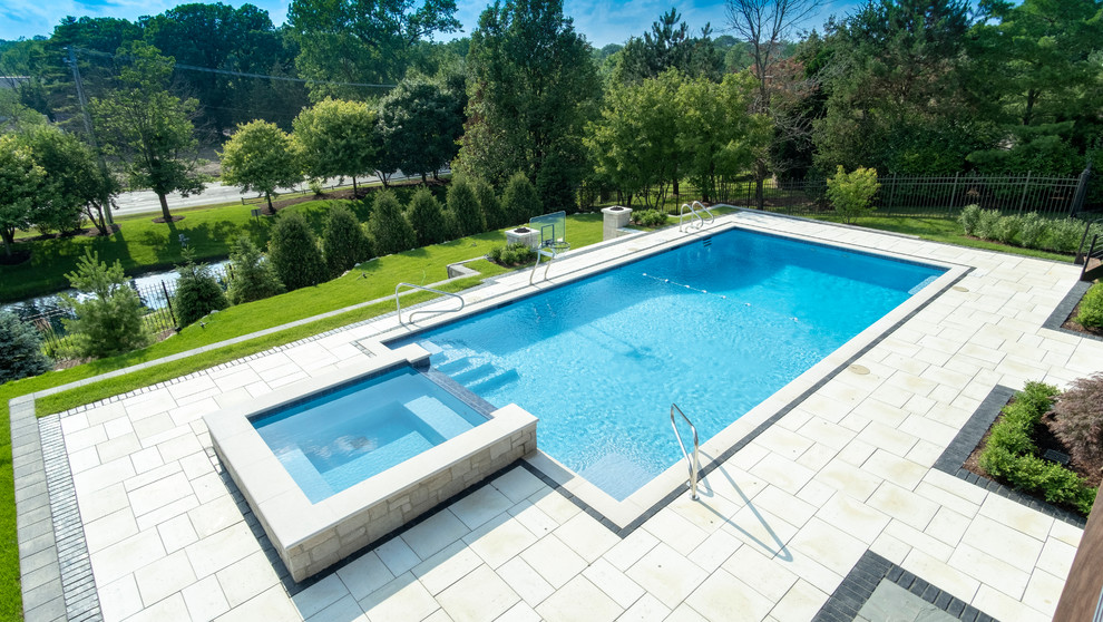 Burr Ridge Lap Pool With Raised Hot Tub And Waterfall Traditional Pool Chicago By Platinum Poolcare