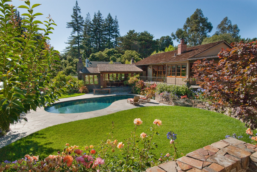 Inspiration for a mid-sized rustic backyard kidney-shaped pool remodel in San Francisco