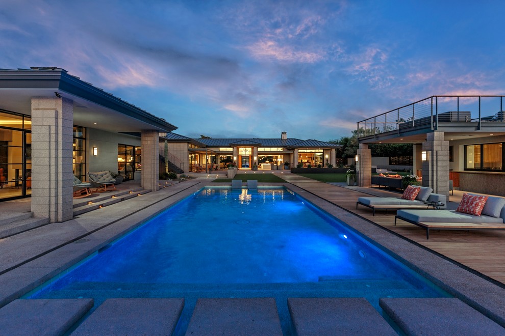 Design ideas for a contemporary rectangular swimming pool in Phoenix with decking.
