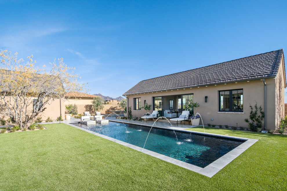 Elegant rectangular lap pool fountain photo in Phoenix