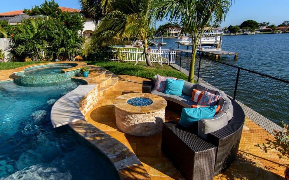 This is an example of a large nautical back kidney-shaped lengths hot tub in Tampa.