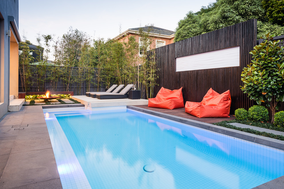 Design ideas for a contemporary rectangular swimming pool in Melbourne.