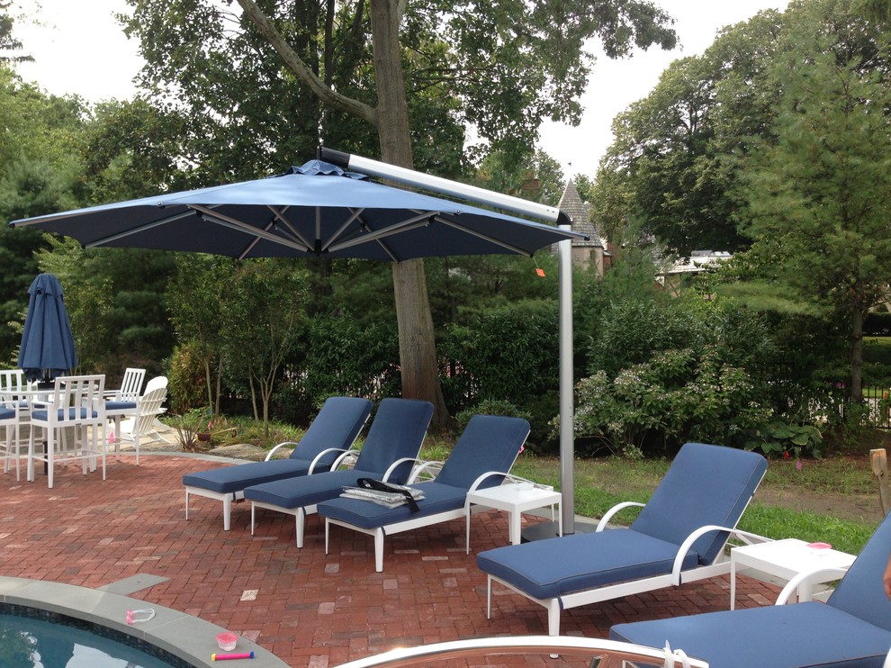 Chaise Lounge Chairs and Umbrella for Pool Area Contemporary Pool New York by Landscaper