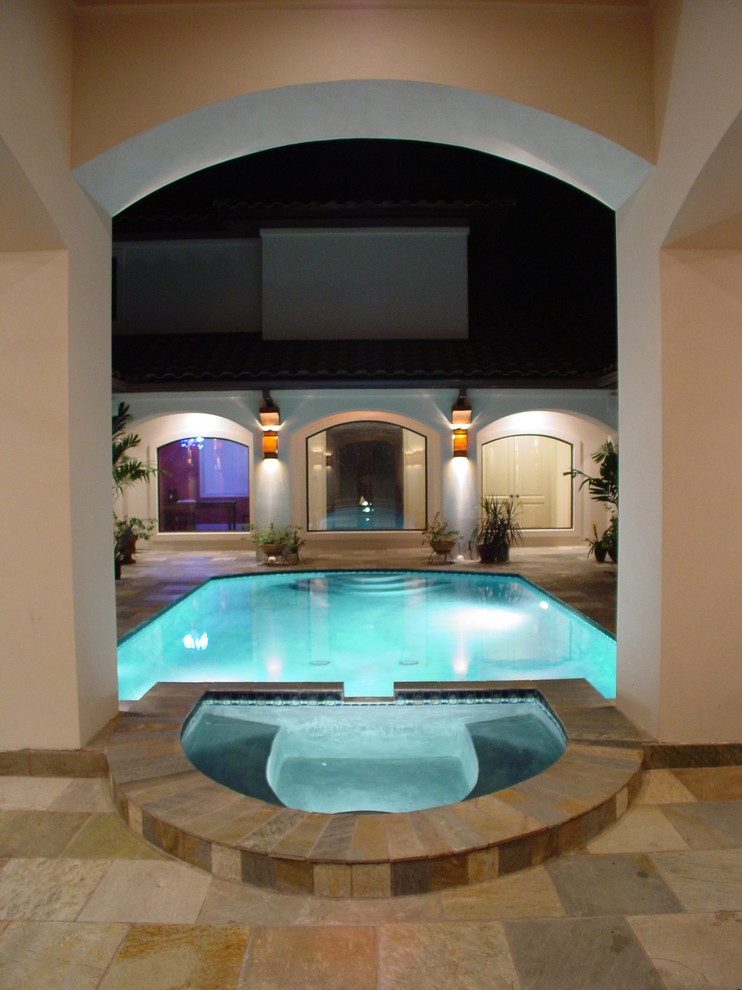 Inspiration for a medium sized mediterranean courtyard rectangular lengths hot tub in Austin with tiled flooring.