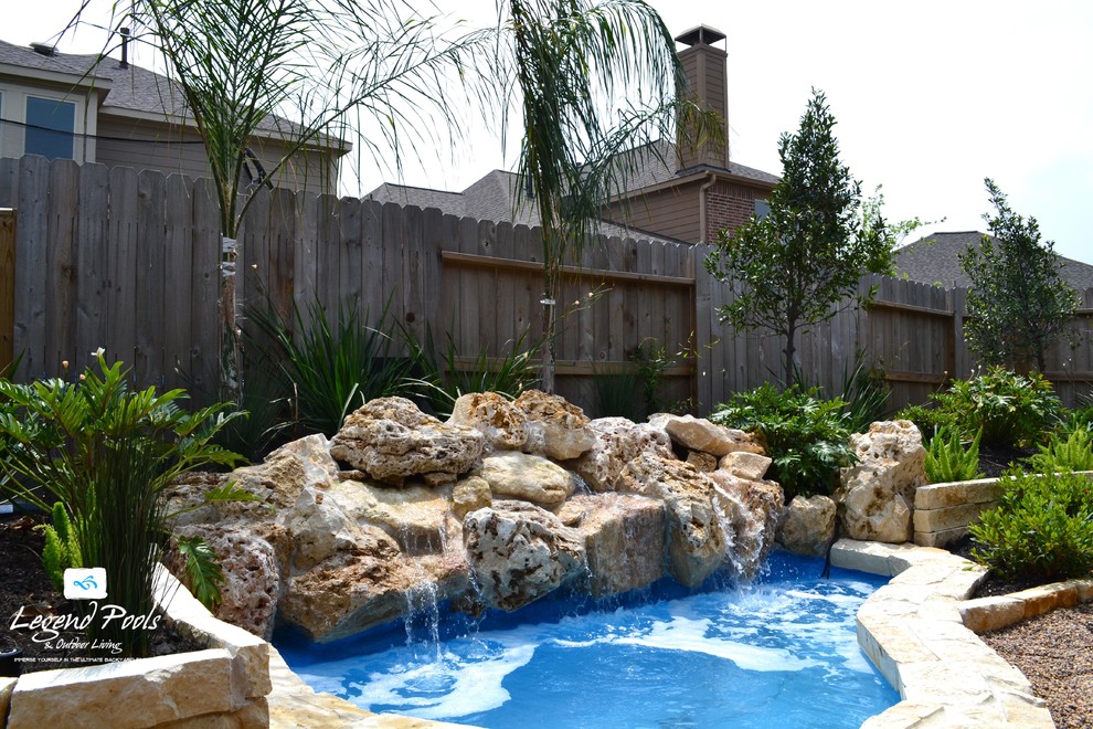 This is an example of a rustic swimming pool in Houston.