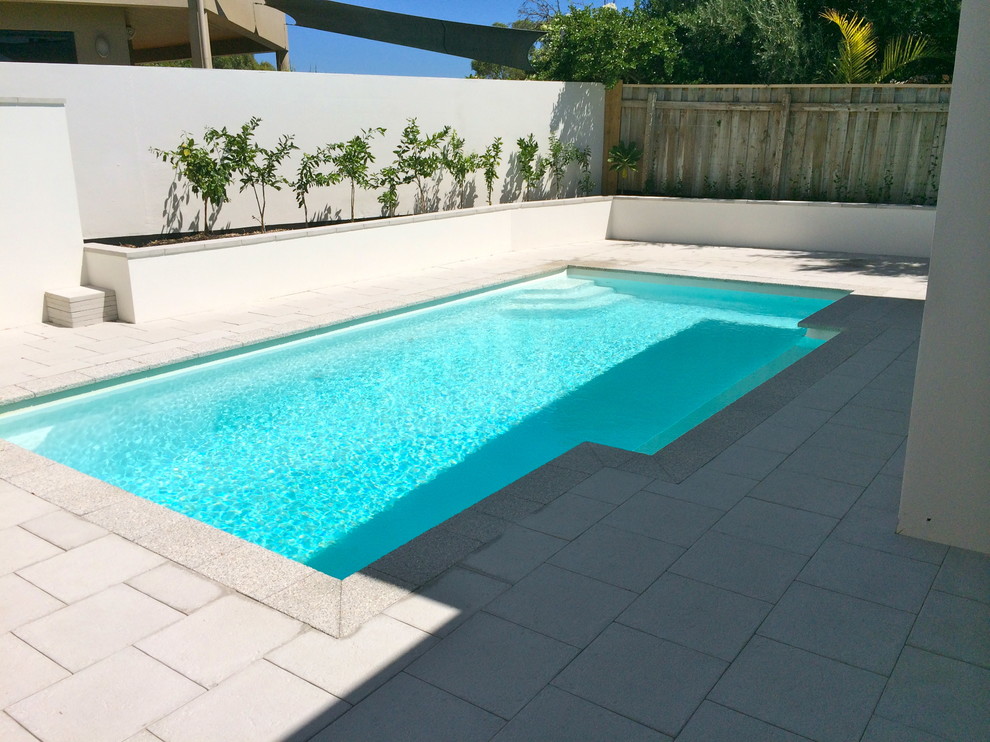 Beach style swimming pool in Perth.