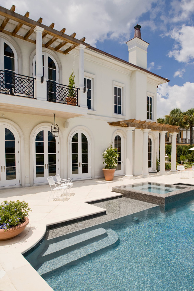 Design ideas for a large mediterranean back swimming pool in Jacksonville.