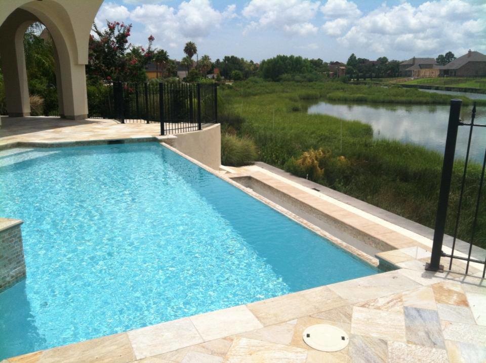 Inspiration for a mediterranean swimming pool in Houston.