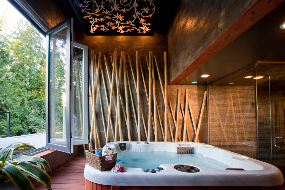 Design ideas for a world-inspired hot tub in Vancouver with a shelter.
