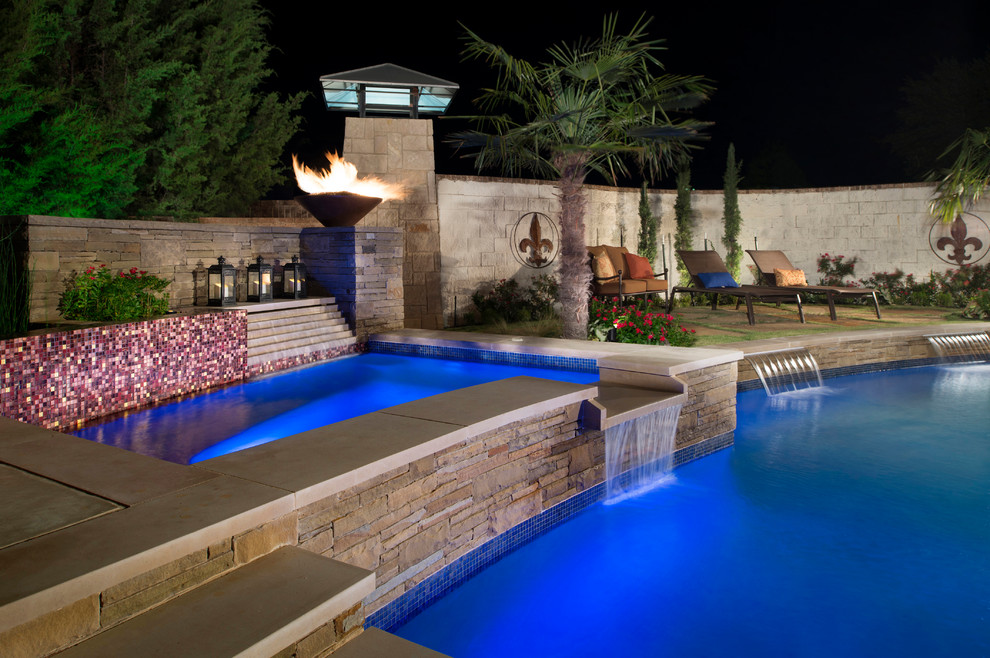 Design ideas for a medium sized modern back custom shaped hot tub in Dallas with concrete paving.