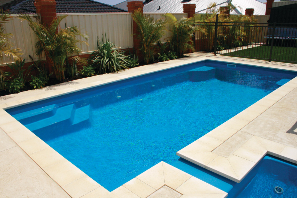 This is an example of a medium sized contemporary back rectangular swimming pool in Perth.