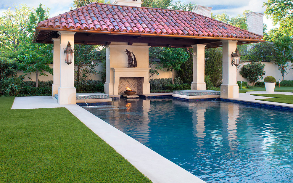 Tuscan backyard rectangular pool photo in Dallas