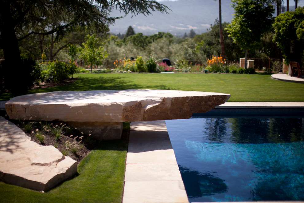 Huge elegant backyard rectangular pool photo in San Francisco