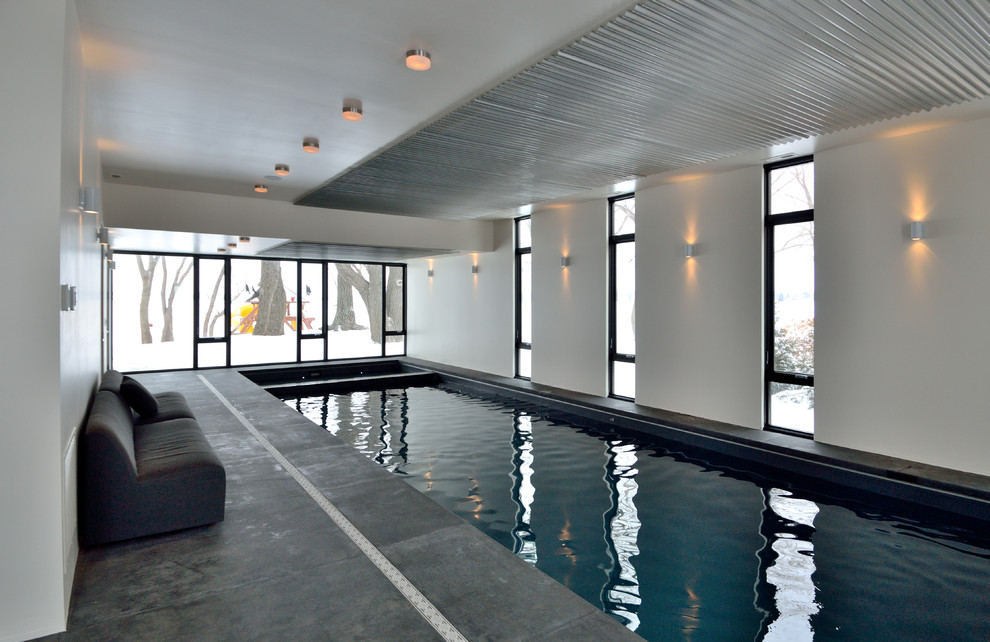 Inspiration for a contemporary indoor rectangular pool remodel in Minneapolis