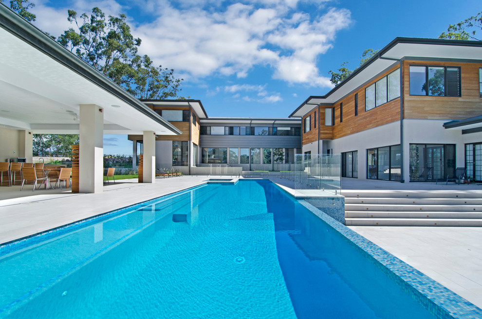 Imagen de piscina alargada contemporánea extra grande rectangular