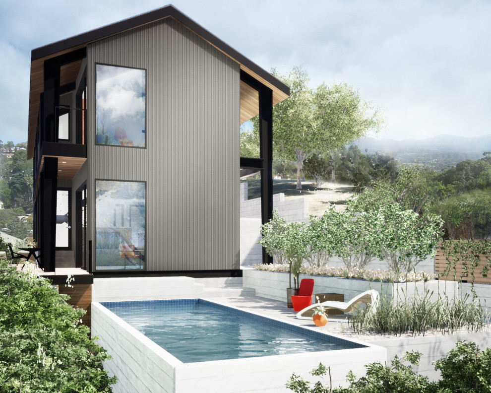 Ejemplo de piscina elevada minimalista de tamaño medio rectangular en patio delantero con losas de hormigón