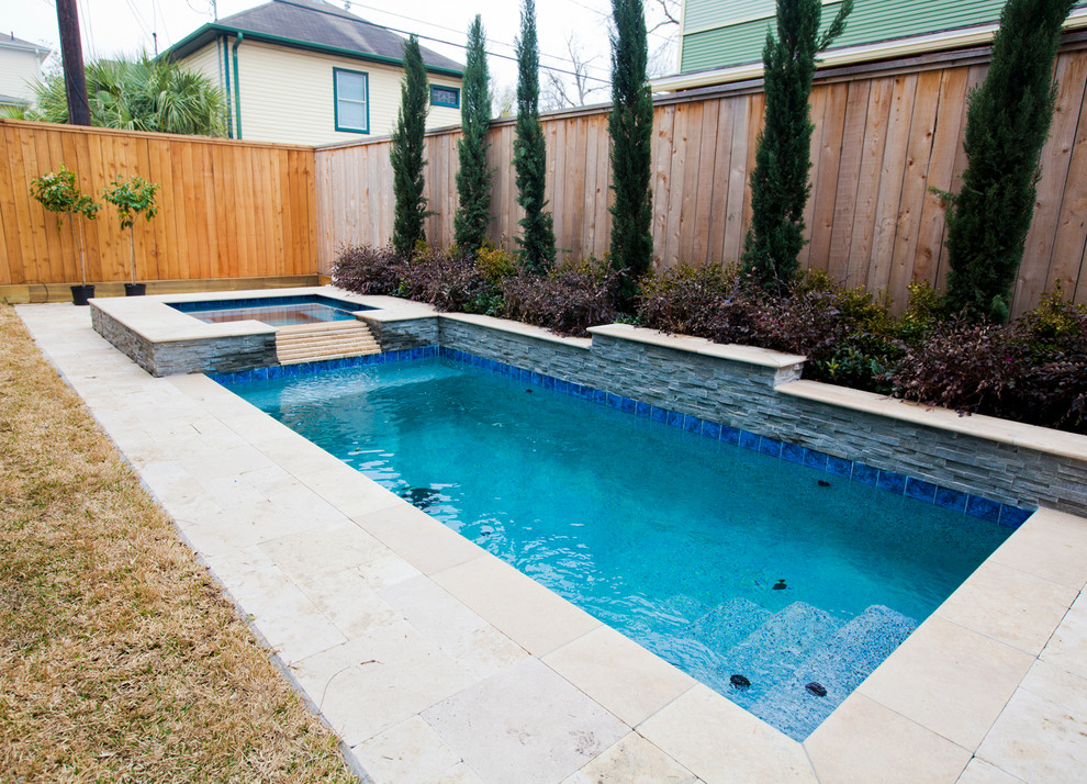 Hot tub - mid-sized craftsman backyard rectangular hot tub idea in Houston