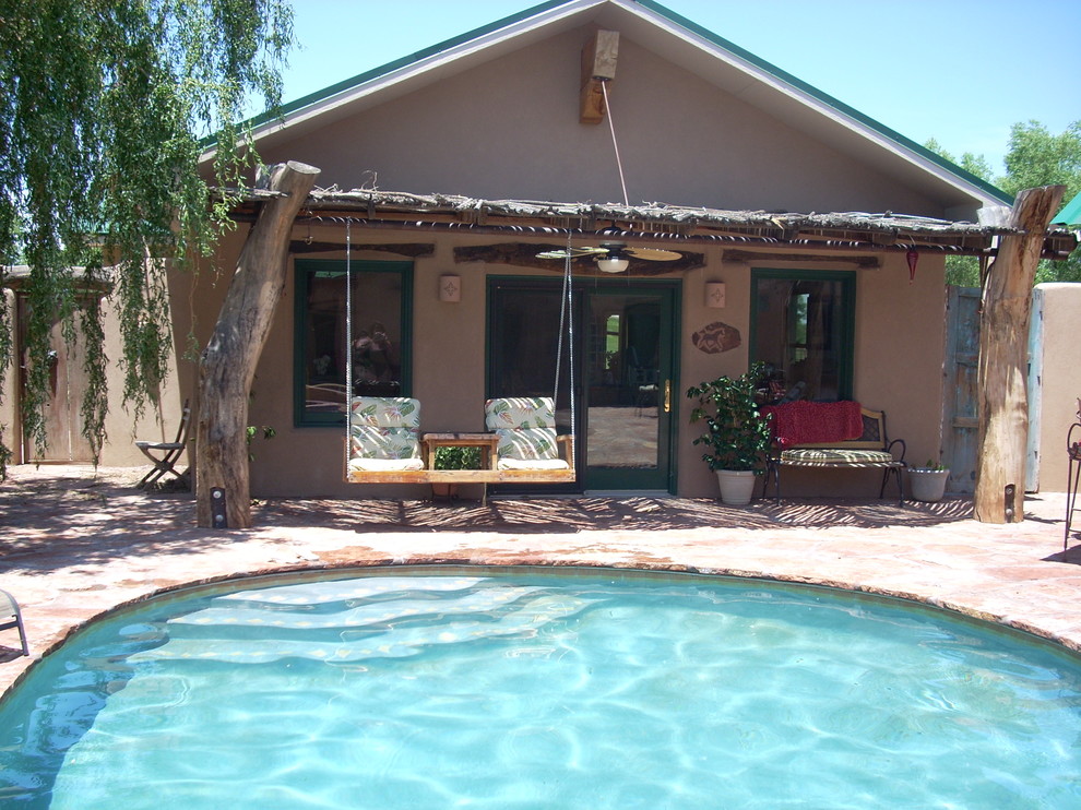 Photo of a rustic swimming pool in Albuquerque.
