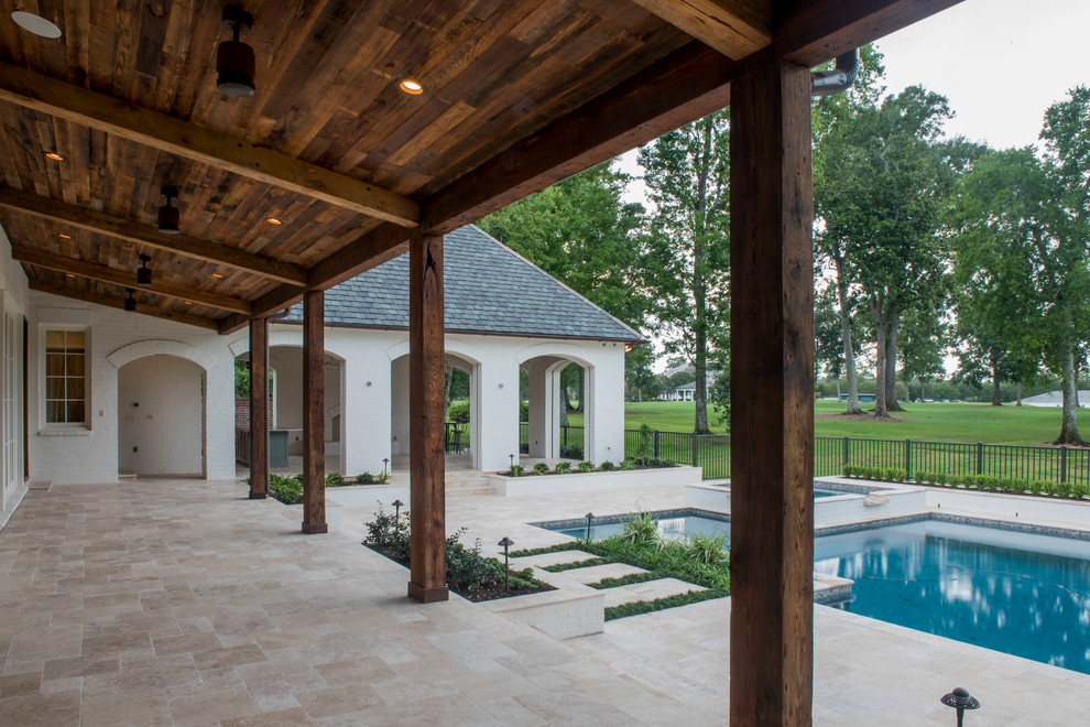 Inspiration for a huge farmhouse backyard tile and rectangular hot tub remodel in New Orleans