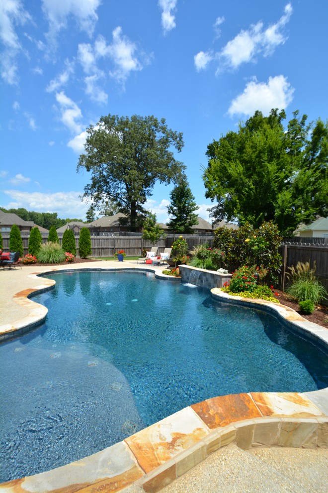 Photo of a large contemporary back custom shaped lengths hot tub in Little Rock.