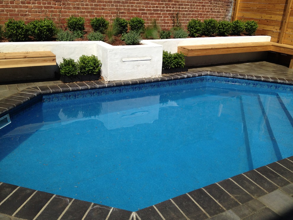 Pool fountain - mid-sized mediterranean backyard concrete paver and custom-shaped lap pool fountain idea in Richmond