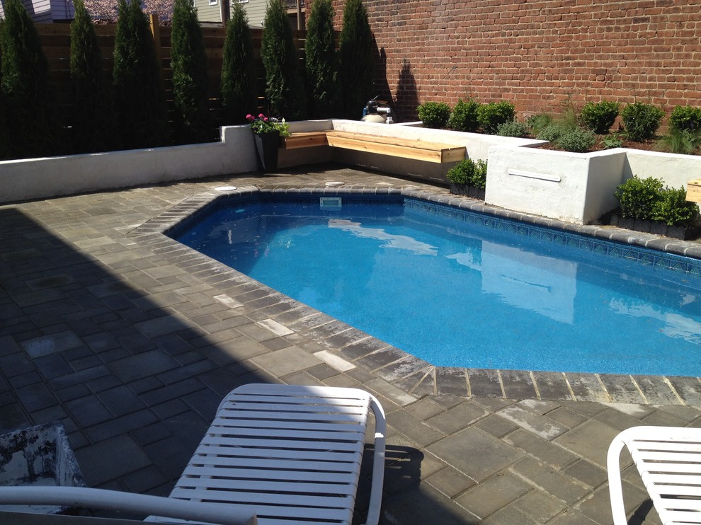 Inspiration for a mid-sized contemporary backyard concrete paver and custom-shaped lap pool fountain remodel in Richmond